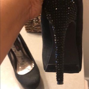 Black platform pumps with studded heel